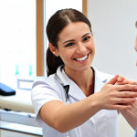 **

A young, smiling physical therapist warmly greeting a patient in a bright, modern clinic setting. Focus on conveying a friendly and reassuring atmosphere. The therapist is actively listening to the patient's concerns.

**